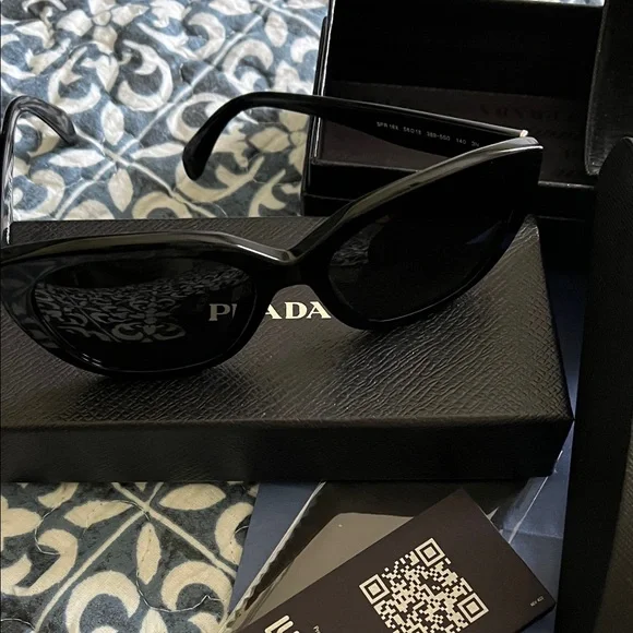 Prada Elegant Black Sunglasses - Picture 2 of 2